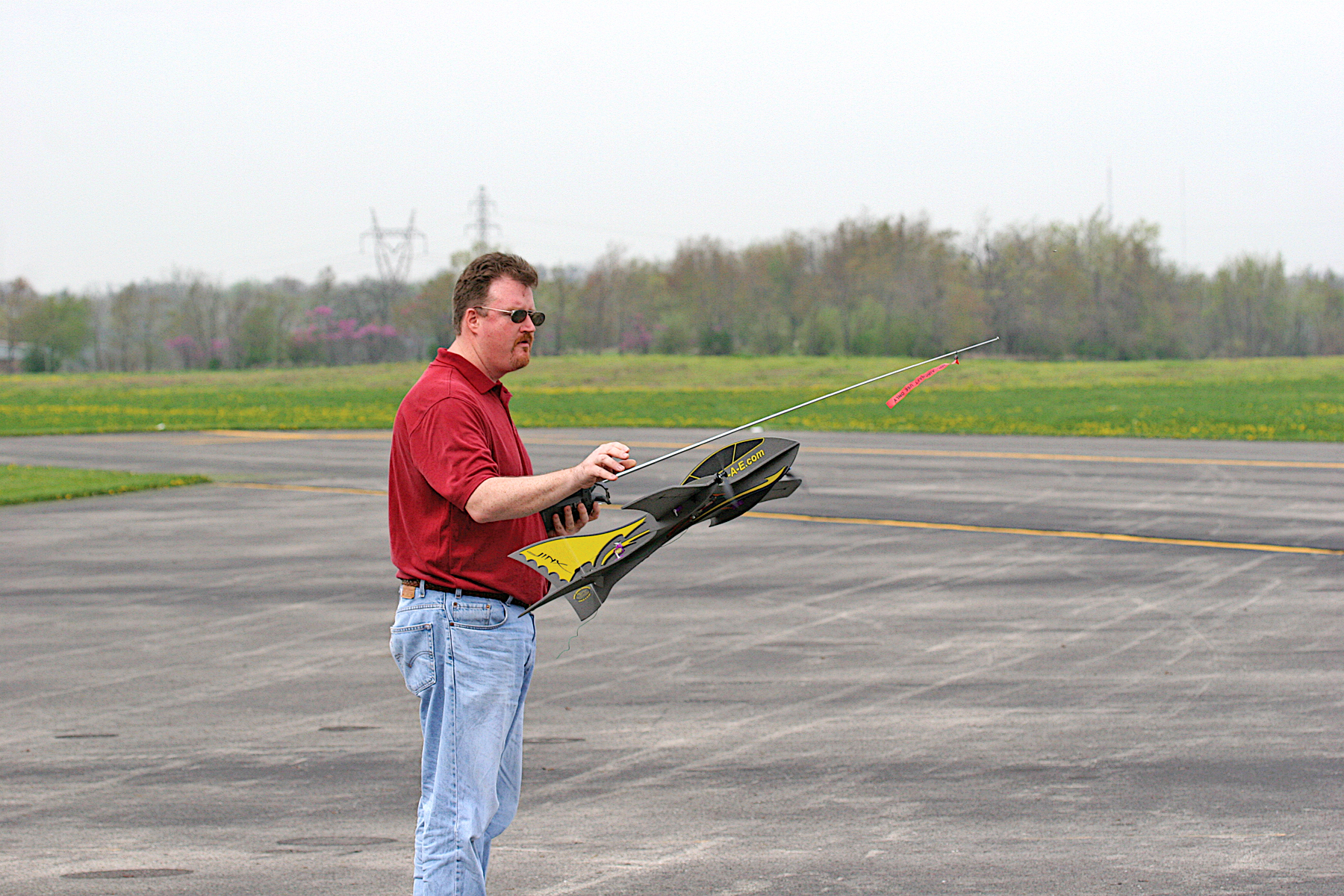 Adequately powered, low-wing models can typically be launched with a smooth underhand motion.